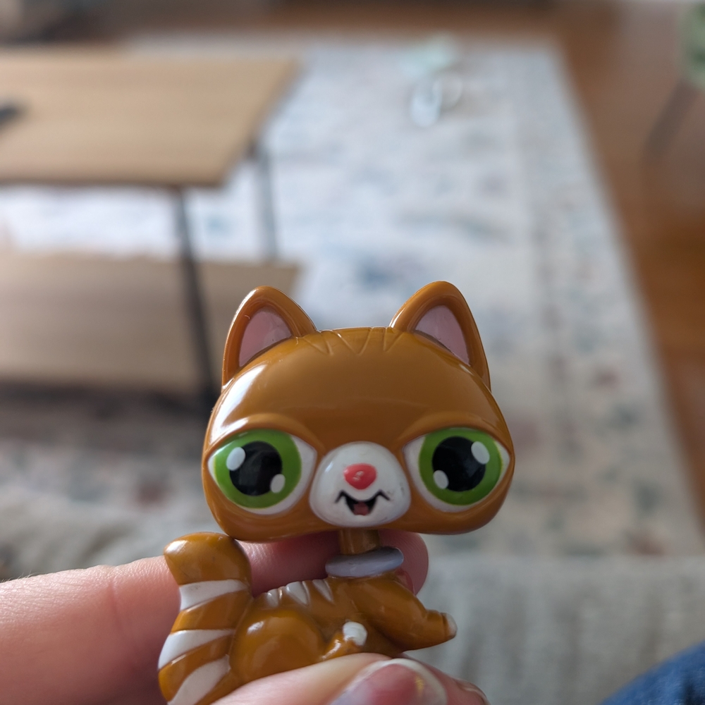 Cute Brown Cat Figurine with Green Eyes